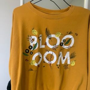 Unknown brand, sweater with “bloom” written